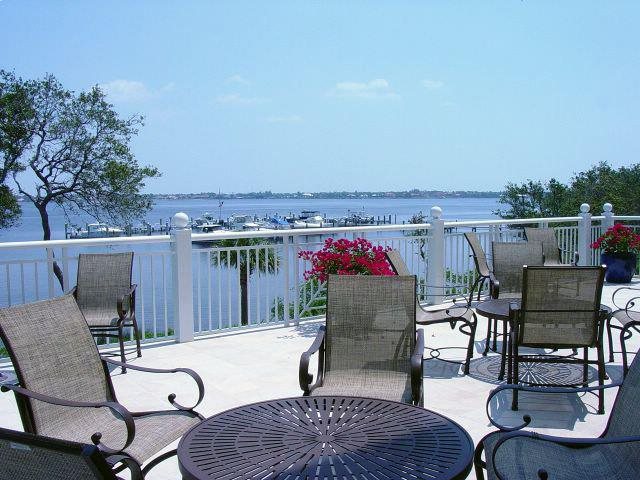 Balcony of home on water with concrete flooring