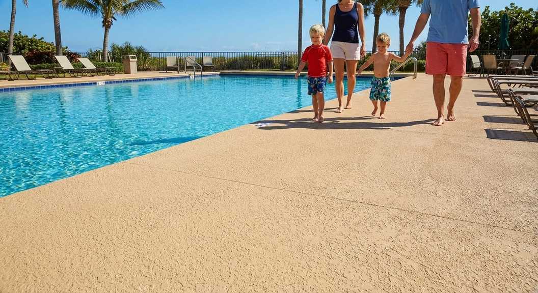 How Spray Texture Improves Palm Beach Pool Deck Safety